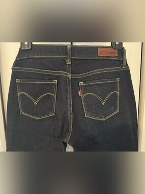 Levi's Slight Curve, Modern Rise, Straight Leg Jeans in Dark Indigo.